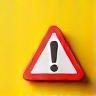 Warning icon for scam awareness